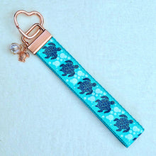 Load image into Gallery viewer, Glittery Sea Turtles Honu on Gold Key Chain Fob with Turtle & Pearl or Starfish Charm