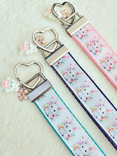 Load image into Gallery viewer, Watercolor Floral White Bun with Bunny and Flower Charms