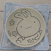 Load and play video in Gallery viewer, Bunnies & Chicks on Light Blue with Polka Dots - Reversible 100% Cotton Bowl Cozy