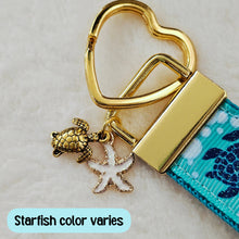 Load image into Gallery viewer, Glittery Sea Turtles Honu on Gold Key Chain Fob with Turtle & Pearl or Starfish Charm