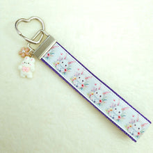 Load image into Gallery viewer, Watercolor Floral White Bun with Bunny and Flower Charms