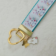 Load image into Gallery viewer, Watercolor Floral White Bun with Bunny and Flower Charms