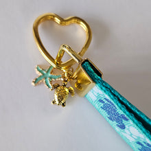 Load image into Gallery viewer, Glittery Sea Turtles Honu on Gold Key Chain Fob with Turtle & Pearl or Starfish Charm