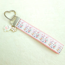 Load image into Gallery viewer, Watercolor Floral White Bun with Bunny and Flower Charms