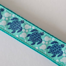 Load image into Gallery viewer, Glittery Sea Turtles Honu on Gold Key Chain Fob with Turtle & Pearl or Starfish Charm