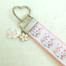 Load image into Gallery viewer, Watercolor Floral White Bun with Bunny and Flower Charms