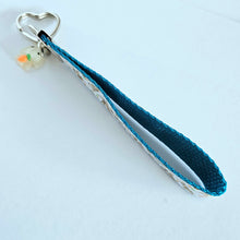 Load image into Gallery viewer, Bunnies with Carrots on White Heart Key Fob Wristlet on Silver or Rainbow