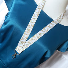 Load image into Gallery viewer, Bunnies with Carrots on White Lanyard with Silver Heart Clasp