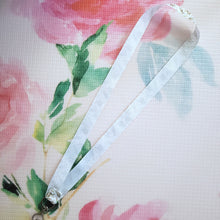 Load image into Gallery viewer, Bunnies with Carrots on White Lanyard with Silver Heart Clasp