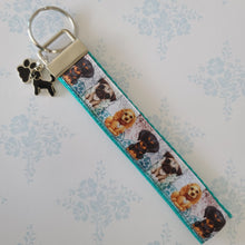 Load image into Gallery viewer, Dog Portraits Cocker Spaniel, Doberman, Pug Key Fob , Dog Key Chain with Enameled Paw Print Charm