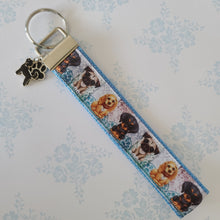Load image into Gallery viewer, Dog Portraits Cocker Spaniel, Doberman, Pug Key Fob , Dog Key Chain with Enameled Paw Print Charm