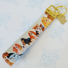 Load image into Gallery viewer, Cute Dogs on Gold Key Chain Fob with Cute Enameled Happy Dog Charm