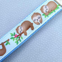 Load image into Gallery viewer, Sleepy Sloths on Blue Silver Key Chain Fob with Charm