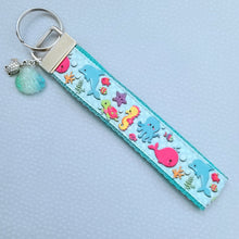Load image into Gallery viewer, Sea Animal Key Chain Fob with Turtles Dolphins Starfish & Whales includes Dolphin or Turtle Charm