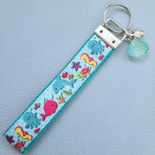 Load image into Gallery viewer, Sea Animal Key Chain Fob with Turtles Dolphins Starfish & Whales includes Dolphin or Turtle Charm