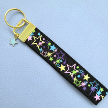 Load image into Gallery viewer, Stars on Black with Glitter on Gold Key Chain Fob with Enameled Star cmCharm