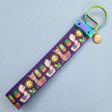 Load image into Gallery viewer, Llamas and Cactus on Rainbow Key Chain Fob with Enameled Flower Charm