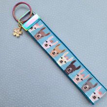 Load image into Gallery viewer, Alpaca Llama on Rainbow Key Chain Fob with Enameled Flower Charm