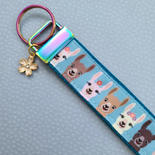 Load image into Gallery viewer, Alpaca Llama on Rainbow Key Chain Fob with Enameled Flower Charm