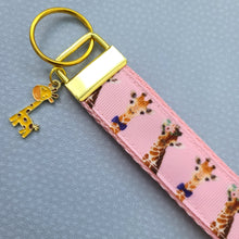 Load image into Gallery viewer, Giraffes on Pink Key Chain Fob with Enameled Giraffe charm
