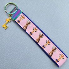 Load image into Gallery viewer, Giraffes on Pink Key Chain Fob with Enameled Giraffe charm