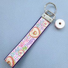 Load image into Gallery viewer, Donut Worry Be Happy on Sparkles Key Chain Fob Wristlet with Yummy Strawberry Donut Charm