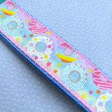 Load image into Gallery viewer, Donuts and Stars on Rainbow Key Chain Fob Wristlet with Yummy Donut Charm