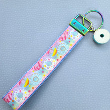 Load image into Gallery viewer, Donuts and Stars on Rainbow Key Chain Fob Wristlet with Yummy Donut Charm