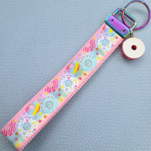 Load image into Gallery viewer, Donuts and Stars on Rainbow Key Chain Fob Wristlet with Yummy Donut Charm
