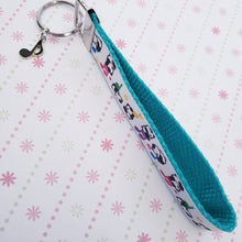 Load image into Gallery viewer, Pandas Sitting on Notes Key Chain Fob with Enameled Note Charm