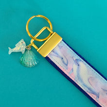 Load image into Gallery viewer, Dolphins in Watercolor Pink Blue Waters on Yellow Gold Key Chain Fob  with Dolphin Charm
