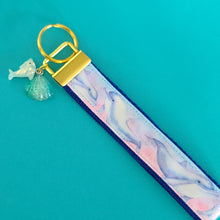 Load image into Gallery viewer, Dolphins in Watercolor Pink Blue Waters on Yellow Gold Key Chain Fob  with Dolphin Charm

