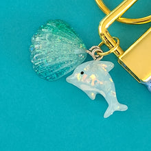 Load image into Gallery viewer, Dolphins in Watercolor Pink Blue Waters on Yellow Gold Key Chain Fob  with Dolphin Charm
