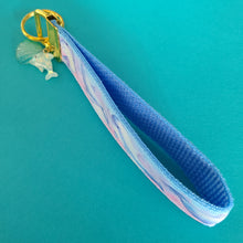 Load image into Gallery viewer, Dolphins in Watercolor Pink Blue Waters on Yellow Gold Key Chain Fob  with Dolphin Charm
