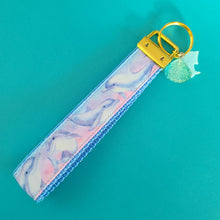 Load image into Gallery viewer, Dolphins in Watercolor Pink Blue Waters on Yellow Gold Key Chain Fob  with Dolphin Charm
