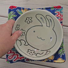 Load and play video in Gallery viewer, Blue Hawaii Reversible 100% Cotton Bowl Cozy - Musubi, Turtle, Ukelele, Hibiscus, Surfboard
