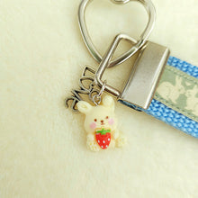Load image into Gallery viewer, Bunnies In Love on Blue Keychain Fob with Cute Bunny Charm
