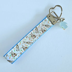 Bunnies with Carrots on White Heart Key Fob Wristlet on Silver or Rainbow