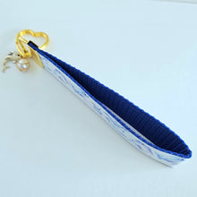 Load image into Gallery viewer, Dolphins in Watercolor on Yellow Gold Key Chain Fob with Gold Dolphin Charm
