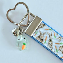 Load image into Gallery viewer, Bunnies with Carrots on White Heart Key Fob Wristlet on Silver or Rainbow
