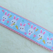 Load image into Gallery viewer, Bunnies with Carrots &amp; Flowers on Light Blue Yellow Gold Key Chain Fob with Enameled Bunny Charm
