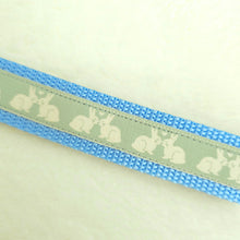 Load image into Gallery viewer, Bunnies In Love on Blue Keychain Fob with Cute Bunny Charm

