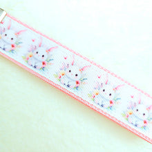 Load image into Gallery viewer, Watercolor Floral White Bun with Bunny and Flower Charms
