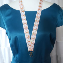 Load image into Gallery viewer, Bunny in Wreaths on Pink Lanyard with Silver Clasp
