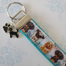 Load image into Gallery viewer, Dog Portraits Cocker Spaniel, Doberman, Pug Key Fob , Dog Key Chain with Enameled Paw Print Charm

