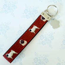 Load image into Gallery viewer, Pugs and Swirls Key Fob with Enameled Paw Print Charm
