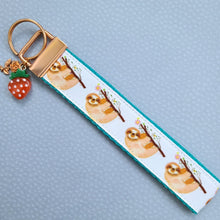 Load image into Gallery viewer, Sloths and Flowers Key Chain Fob with Strawberry and Leaf Charm
