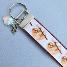 Load image into Gallery viewer, Sloths and Flowers Key Chain Fob with Strawberry and Leaf Charm
