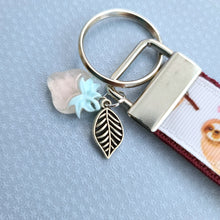 Load image into Gallery viewer, Sloths and Flowers Key Chain Fob with Strawberry and Leaf Charm
