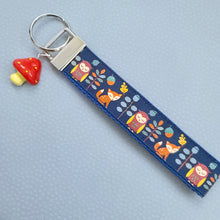 Load image into Gallery viewer, Fox and Owl Glittery Blue Key Fob Wristlet with Mushroom Charm
